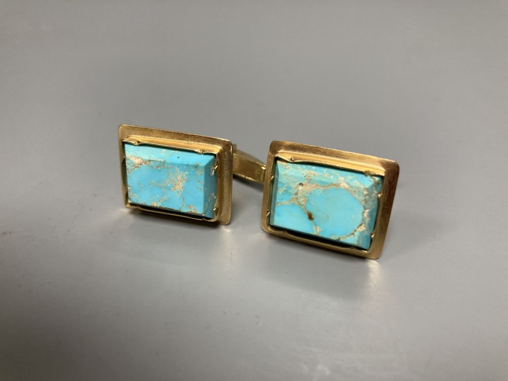 A pair of yellow metal and turquoise set rectangular cufflinks, 20mm, gross 15.8 grams.